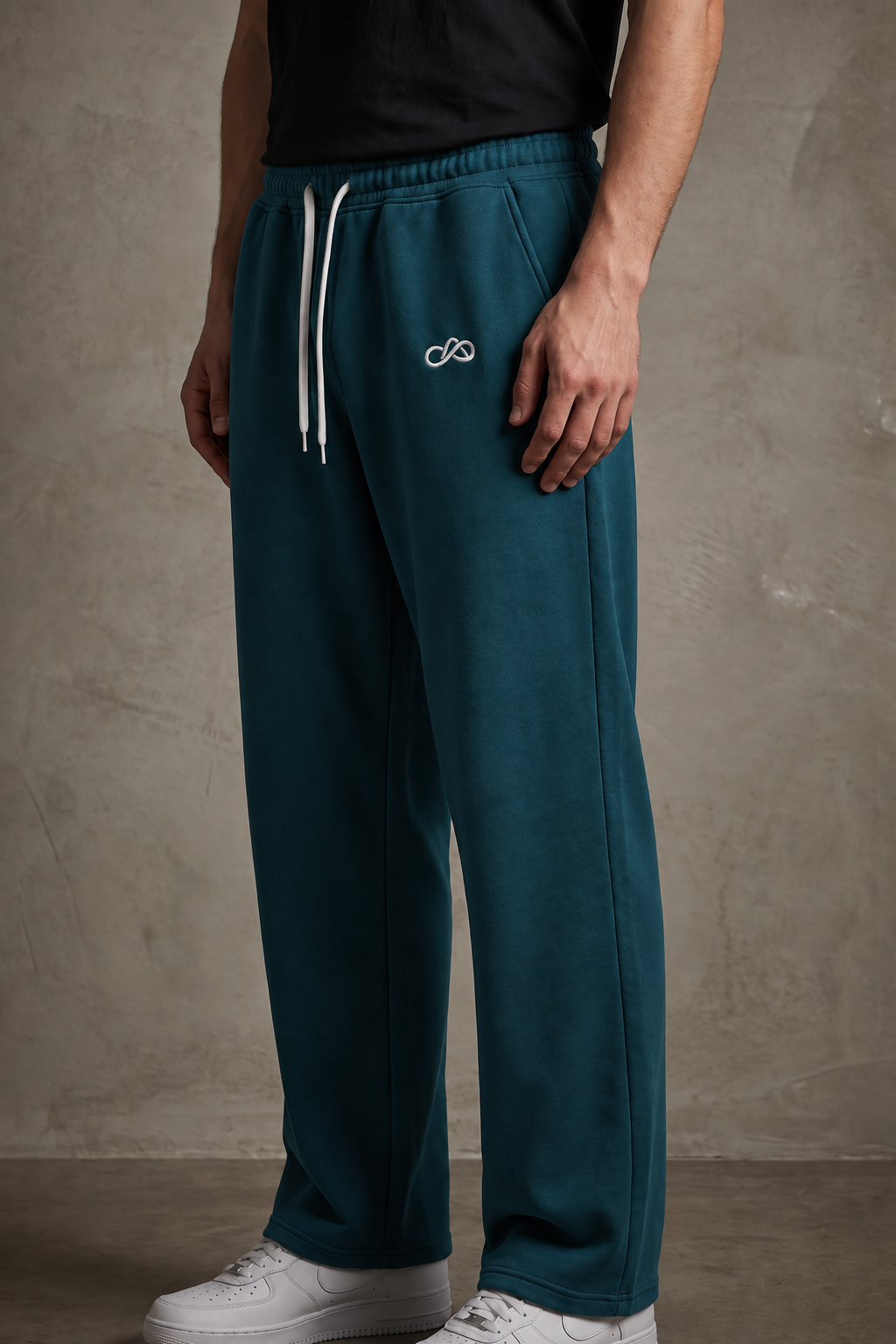ANANT Elevate Wide-Leg Joggers teal side model view